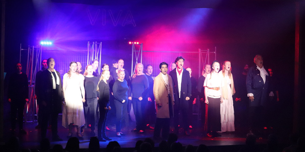 An Evening on Broadway 2023 Cast Image featuring the entire ensemble performing a medley from, "Les Misérables'.