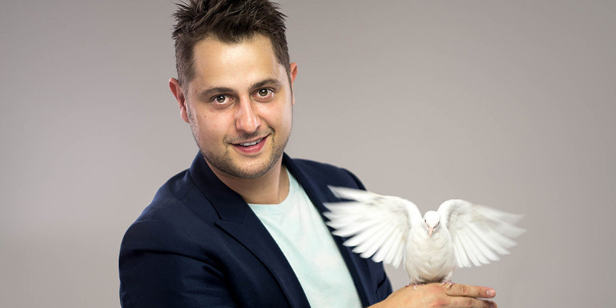 Mickster holing his fan and his favourite magical dove, he is just one of many tricks at his birthday party. Do not miss this magical packed show of tricks and illusions.
