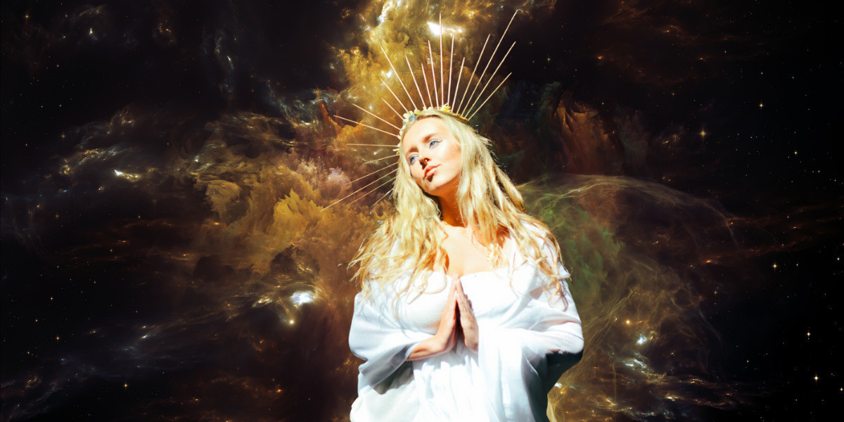 Woman dressed as Mother Mary/goddess symbol with a background of gold, exploding cosmos.