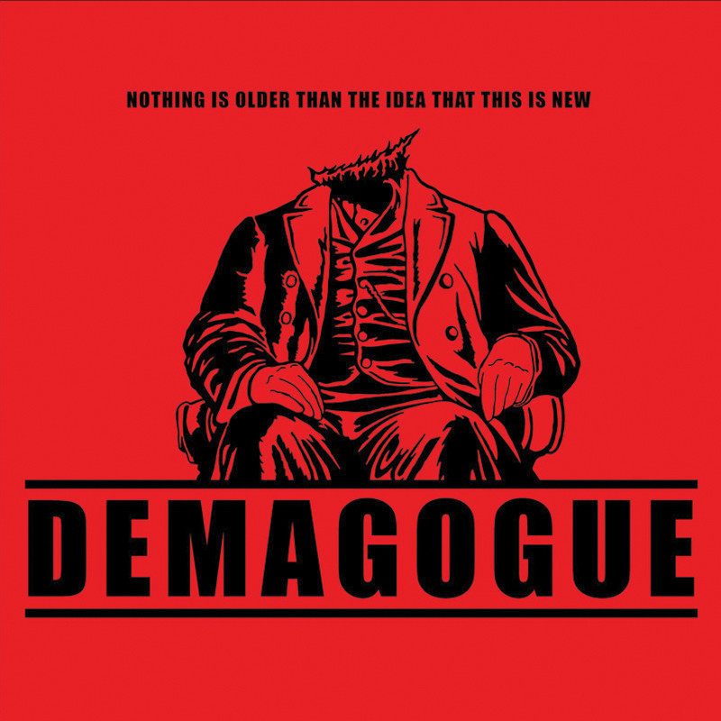 Demagogue - A black silhouette on a vivid red background depicting an iron statue of a man in olden day garb sitting on a large chair. The statue has been clearly sawed off at the head. The artwork features the title of the work 'Demagogue' along with the tagline 'nothing is older than the idea that this is new'.