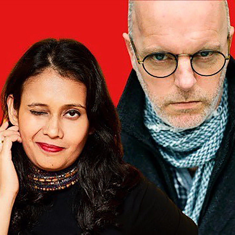 A Star is Torn - Image of two people, a woman winking on the left with her hand to her ear and a man on the right in glasses and a black jacket and blue scarf