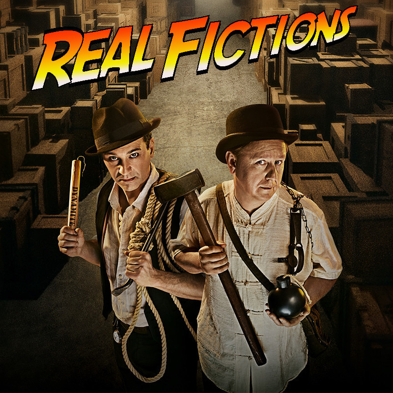 Real Fictions - Impossibilities, unpleasantries and other stupid and ridiculous things... - Two men, one in a fedora and the other in a bowler hat, stand side by side draped in various weapons. The text above them reads Real Fictions in a font resembling Indiana Jones.