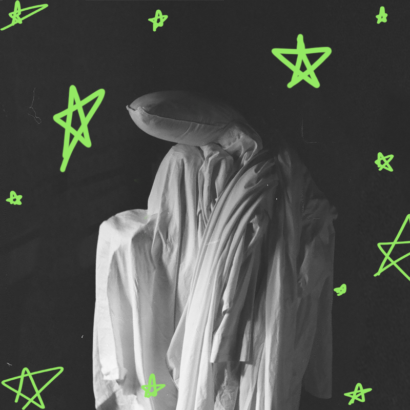 A ghost like figure made of bed sheets and pillows stands centre whilst drooping. Green hand drawn stars surrond the figure.