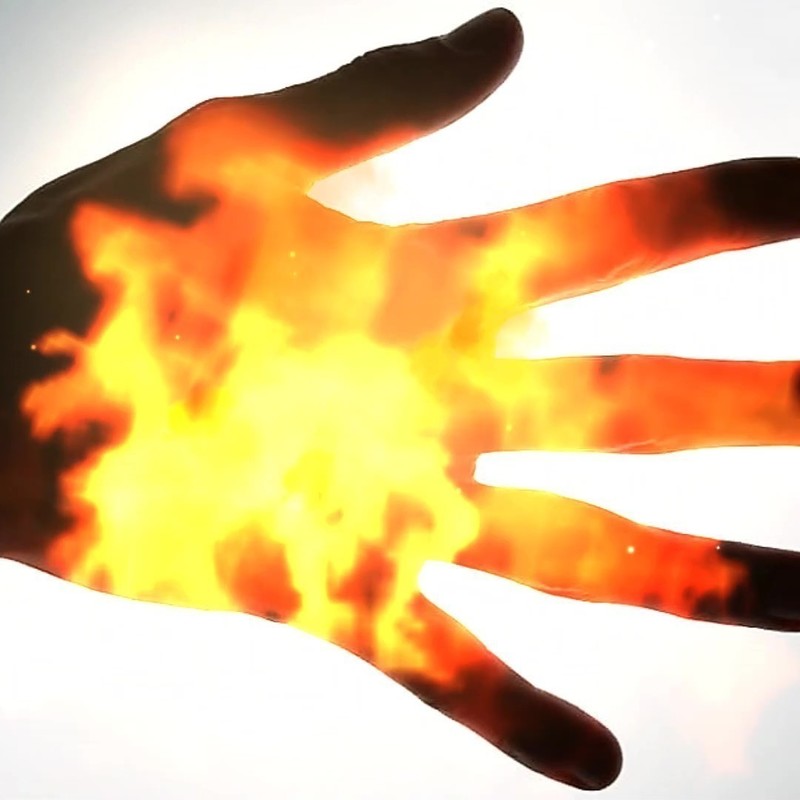 A flaming hand symbolizing the intense rock music of classic Oz band Midnight Oil