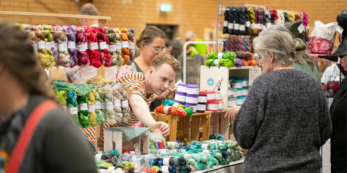 Folks shopping for hand-dyed yarn