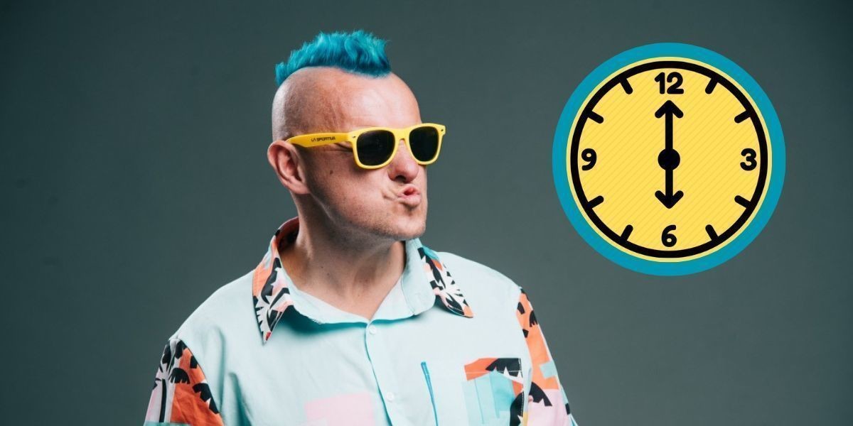 MICKEY D: 6 o'clock Mick. - Comedian Mickey D is wearing a brightly coloured shirt and yellow sunglasses. He is pursing his lips at a clock that reads 6pm.