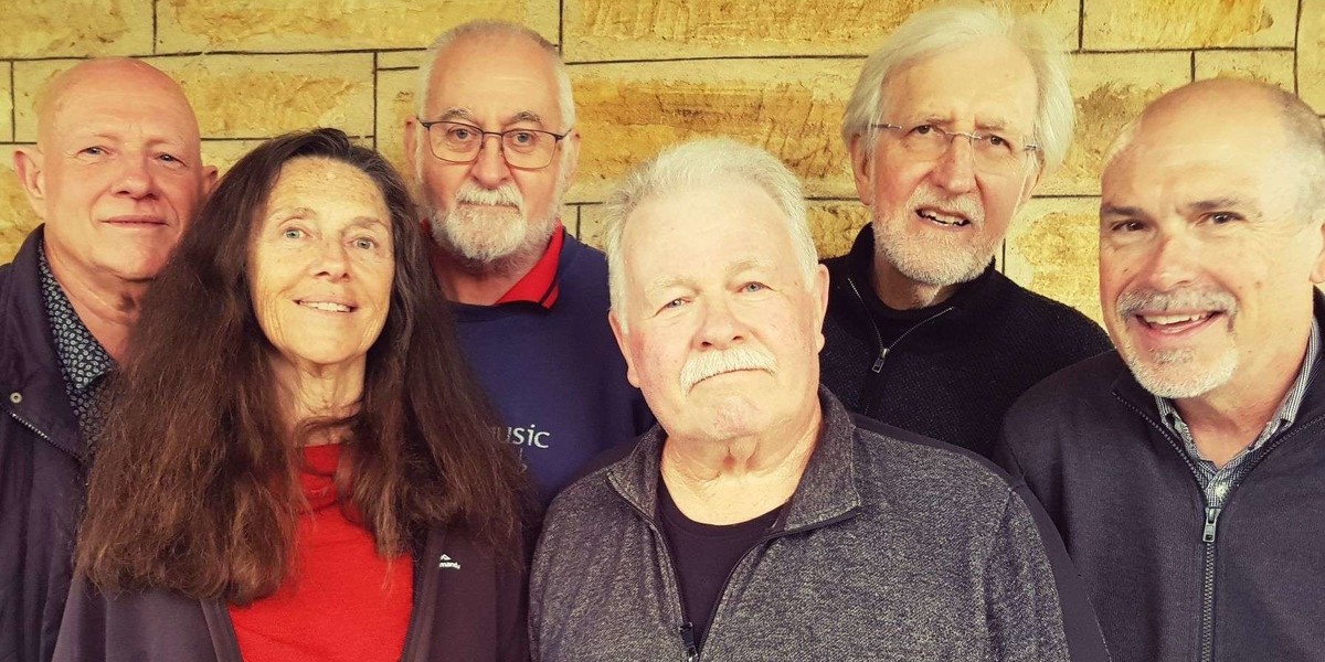 Fifty years on from the year 'Buffalo Drive' formed, five original members from 'The Henchmen', 'Genesis', and 'Buffalo Drive' have regrouped to relive the songs, the joy and the fun times. 
Pictured from left to right are: Rod Boucher (lead vocals, guitar, banjo, mandolin), Georgina Nou (vocals, percussion), David "Jacko" Jackson (double bass, keyboards, vocals), Rodney "Bodzac" Dunn (drums, percussion, vocals, random noises and comments), Graham "Grimy" Bettany (bass, 12 string guitar, vocals) assisted by Peter Farley (guitars, vocals).