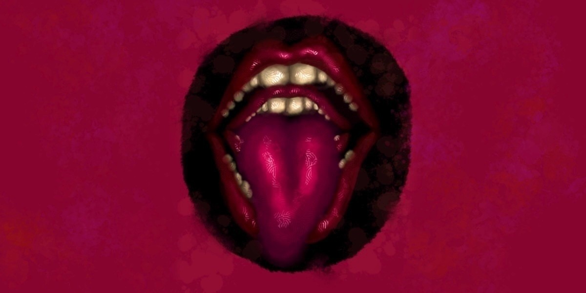 The Mouth Inside The Mouth - Pink lipped mouth with its' tongue out, inside another pink lipped mouth.