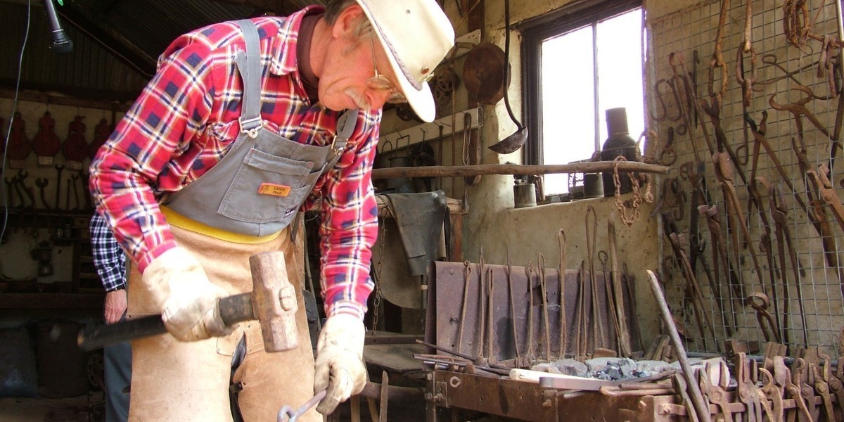 Blacksmith Lance Peck in our Blacksmith forge