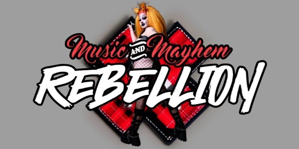 Drag performer Yummmy dressed in punk attire before a tartan punk patch with the words "Music and Mayhem:  Rebellion"