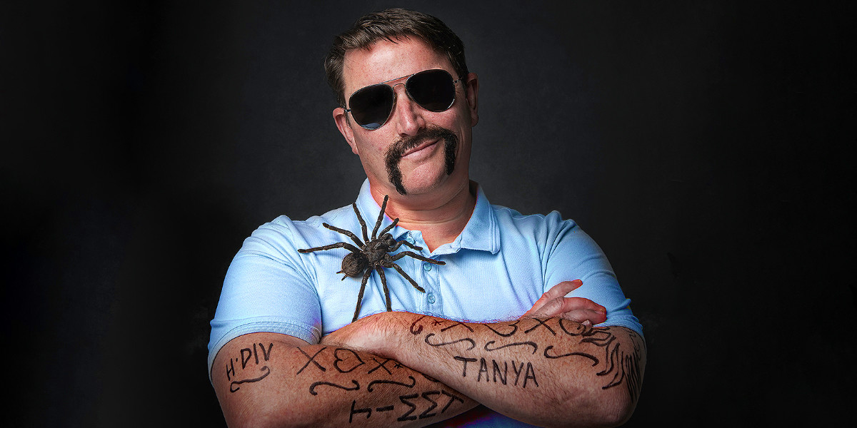 Heath Franklin's Chopper - Not Here To F*ck Spiders - Chopper, arms folded with a big hairy spider on his chest