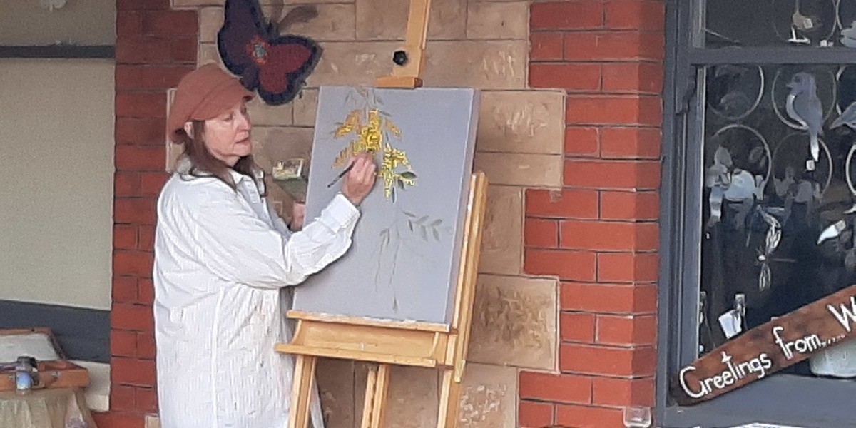 Artist demonstrating painting