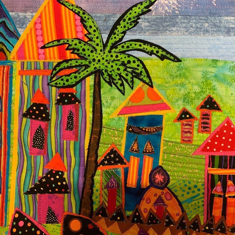 HOMO FABER and The Tree of Us plus 1 - A close up image of a quilted textile art work featuring colourful wonky houses