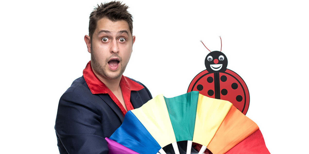 Mickster is holding a colourful fan and a beetle was hiding behind it and now appears from behind the fan. Lots of magical tricks for all to enjoy at his birthday party.