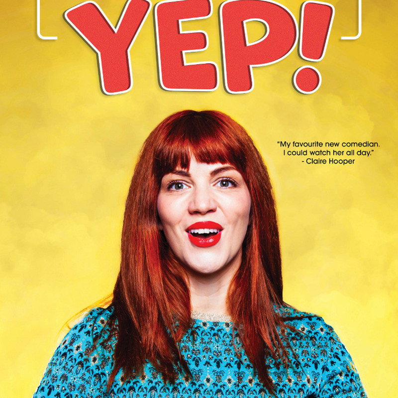 Bron Lewis - Yep - Poster with yellow backdrop. A lady with red hair pictured smiling wearing red lipstick.