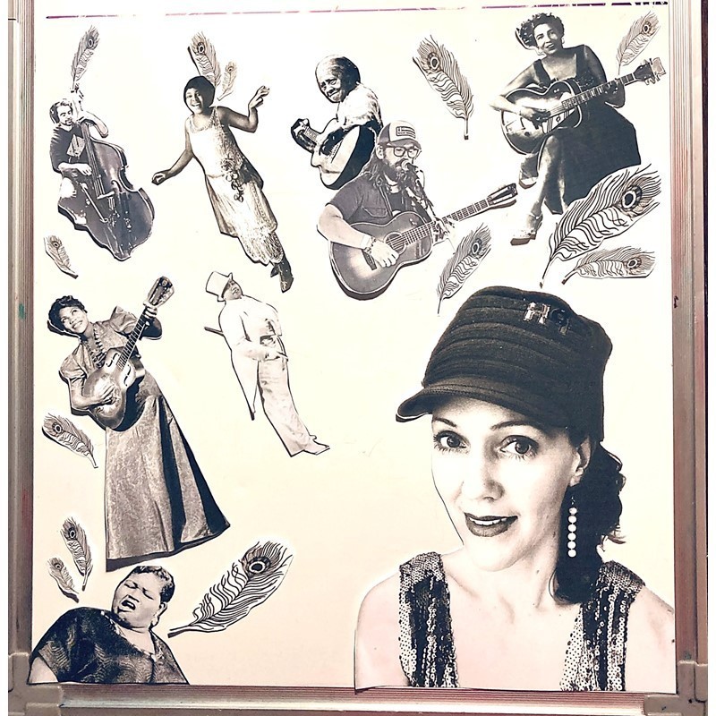 Her Story - Black and white collage of female musicians from the 1920’s wearing long dresses and playing guitars. 2 contemporary males dressed casually are  playing guitar and double bass.
Bottom right corner of image features a close up of Mary Trees and consumes 1/3 of the image. She is wearing a riding cap, sequinned dress and 6 pearl string earring, Facing the camera and smiling.
Remaining musicians appear in an arch from bottom left to top right corner.
Black and white ostrich feathers float among the collage.