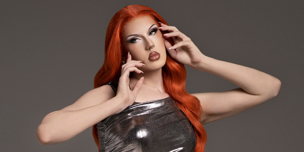 This Is My Drag Show - Image of Kane Enable in a styled ginger wig, and silver dress.