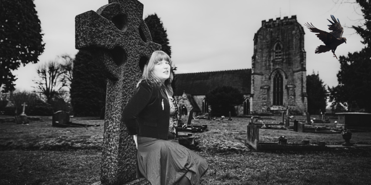 Sorcha in gothic graveyard with raven flying