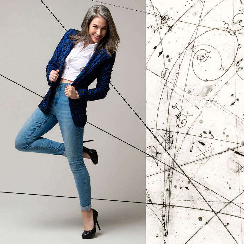 Atomically Correct - A smiling woman in a blue jacket and jeans leans dramatically to the left while an image of swirling lines sends lines towards her.