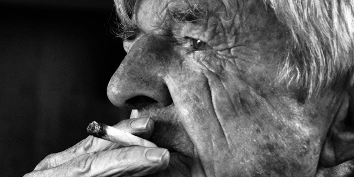 Yer Old Faither - Close up image in black and white of John Croall smoking a cigarette