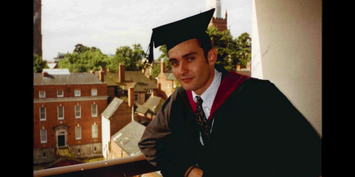A young Gordon in mortar board and pestle graduation from University in the 1990's