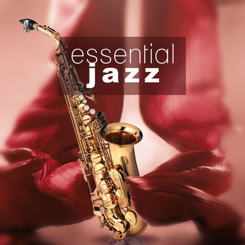 Essential Jazz - A saxophone with red curtain.