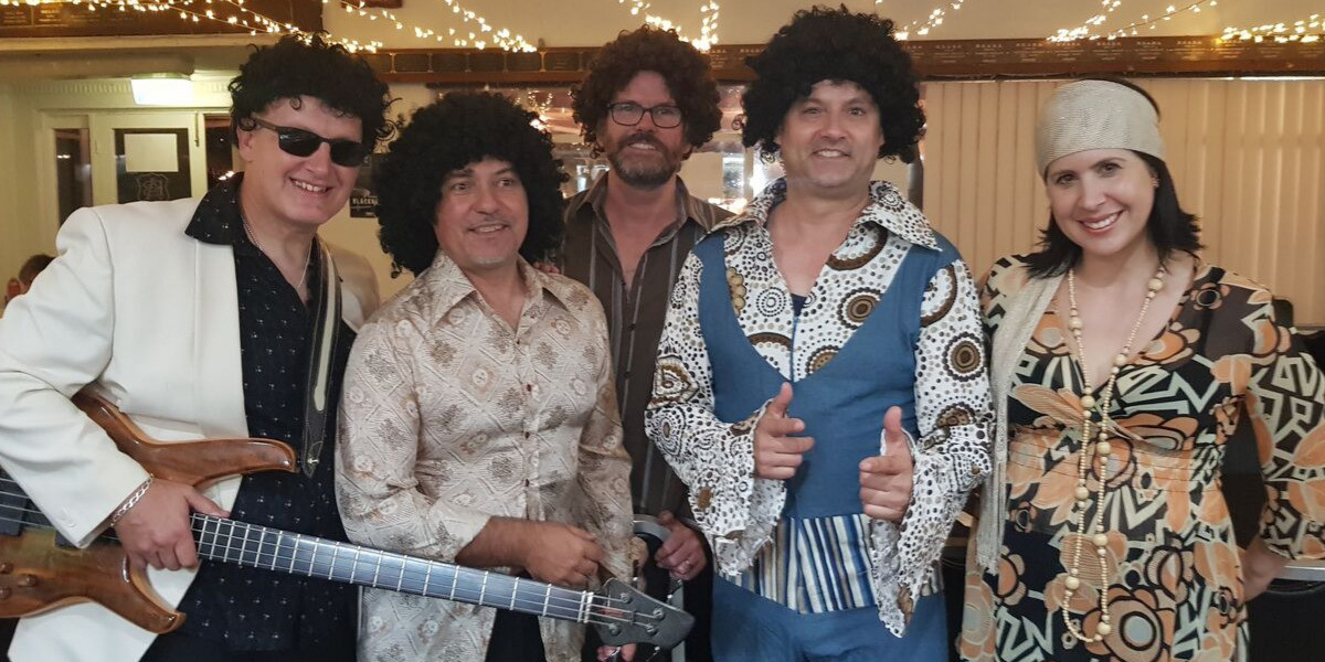 It is the seventies night... all band members wearing Afro hairstyles,   also wearing tight body shirts and pants as they did in that era.     A fun night ahead planned,     this band plays all of the popular disco hits.