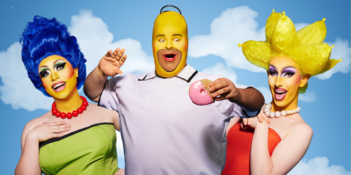 The Stripsons - An image of three performers set on a cloudy blue background. The three performers are painted yellow as characters from the Simpsons.