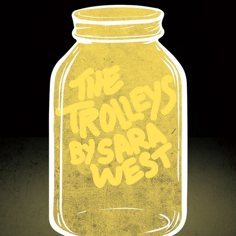 The Trolleys - Upright yellow jar with the text The Trolleys written by Sara West