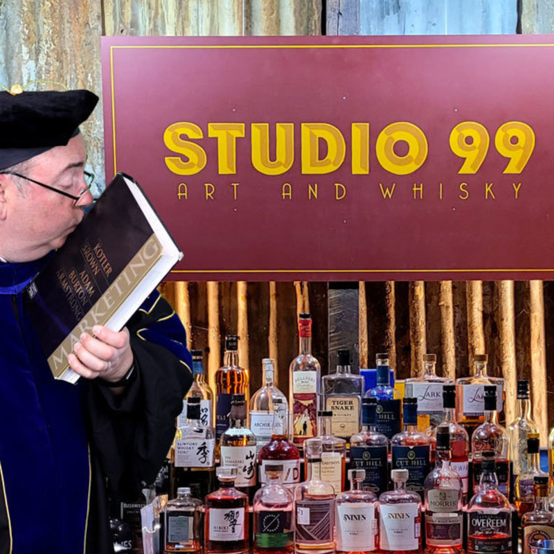 Professor Sebastian Longsword not only tastes all the whisky at Studio 99 but he always kissed his Marketing textbook.