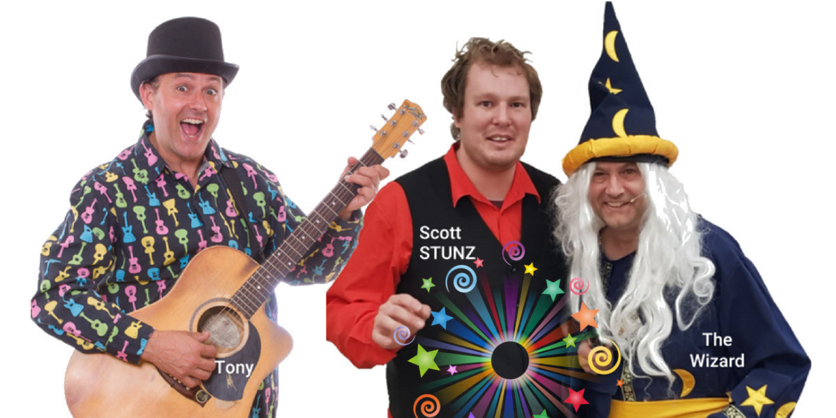 Magic Music Show - Tony is posing wearing his guitar shirt while Scott is posing in his magic attire with The Wizard costume character is standing next to him
