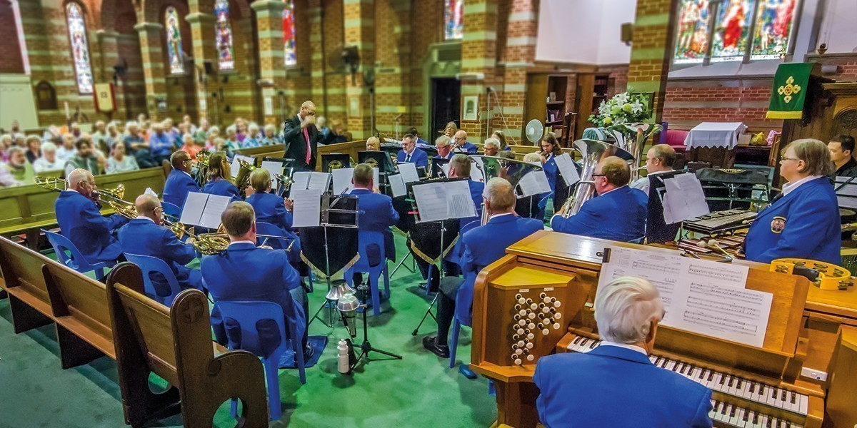 Campbelltown City Band plays in a church