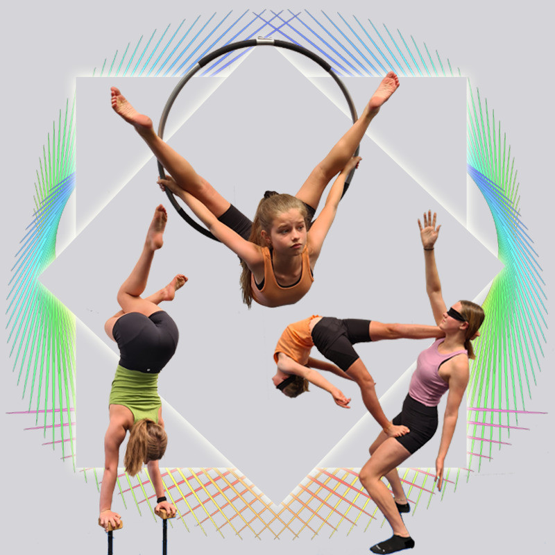 One performer contorts with her feet behind her head in the aerial hoop. Another acrobat balances on a pair of handstand canes with her legs crossed. Two acrobats perform a partner skill. One leans backward whilst the other balances on her partners thigh with her other foot behind her bases head creating a flag shape.