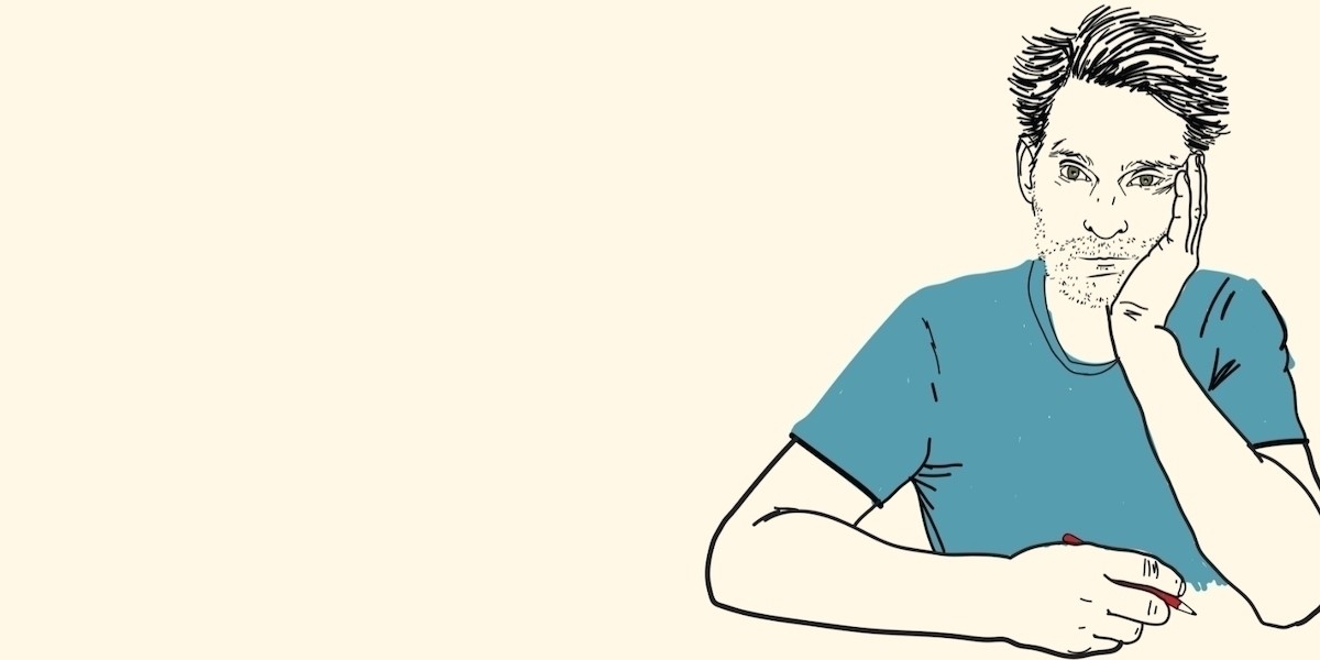 Luke Heggie - Grogan - A drawing of a man wearing a blue t-shirt. His left cheek is placed in the palm of his hand and he's holding a red pencil in the other.