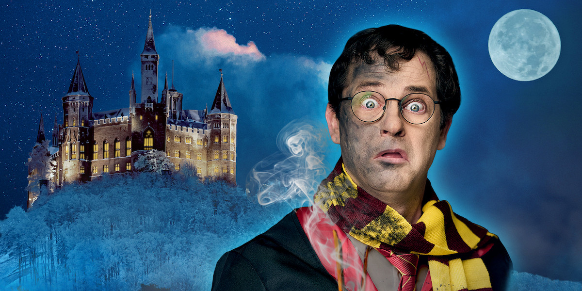 Barry Potter and the Magic of Wizardry - Bespectacled robed wizard with look of flabbergasted incredulity in front of an impressive castle on a hill at night.
