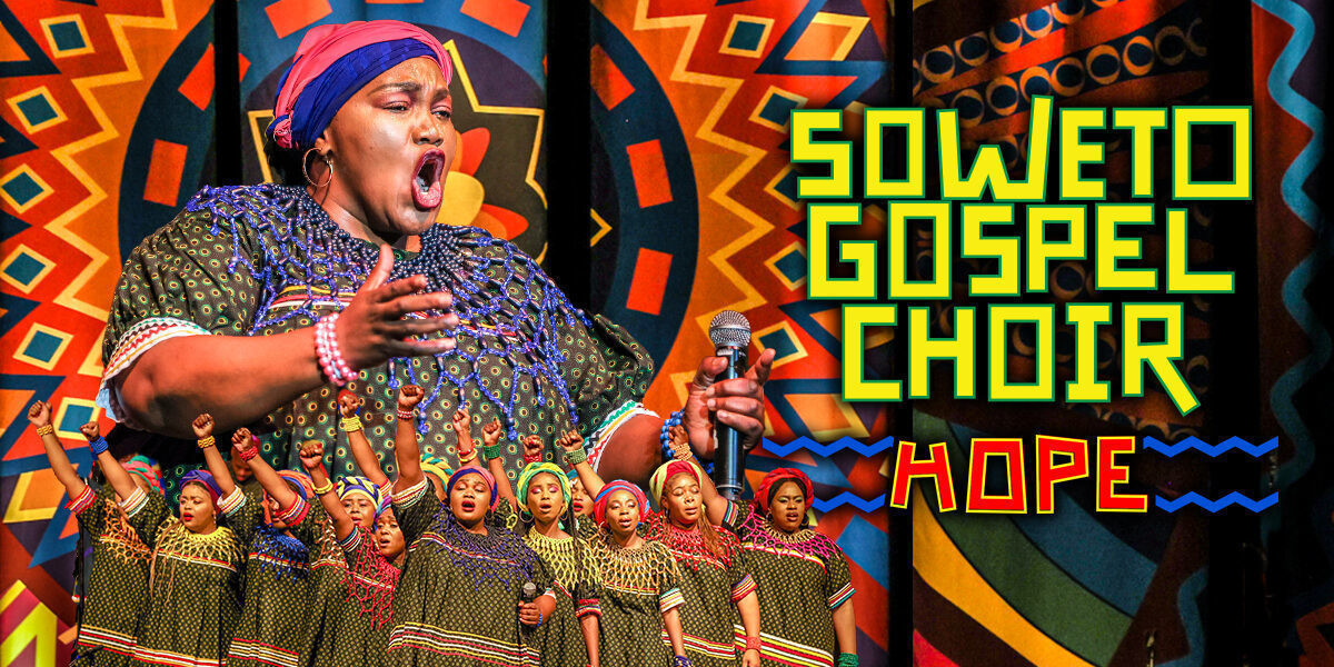 SOWETO GOSPEL CHOIR - HOPE - A woman stands in the centre of the image with her hands in the air. The rest of the choir circles around her creating a blurry motion.