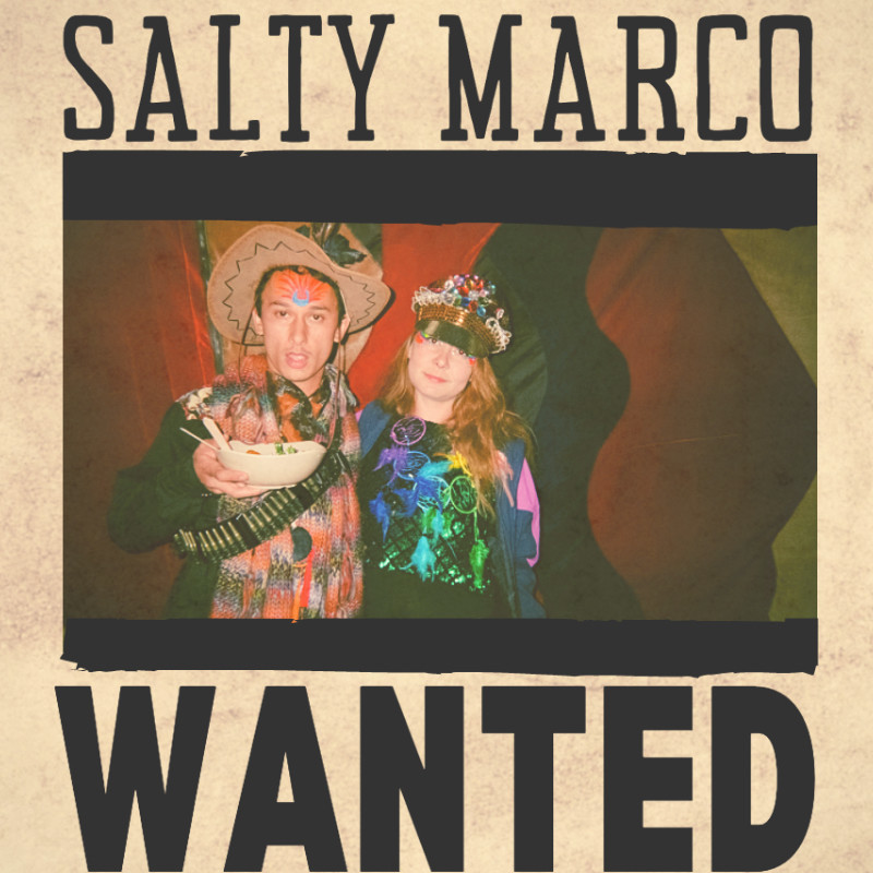 An image of two people dressed up in colourful outfits. The text on the image reads ‘Salty Marco’ and ‘Wanted’ in black font.