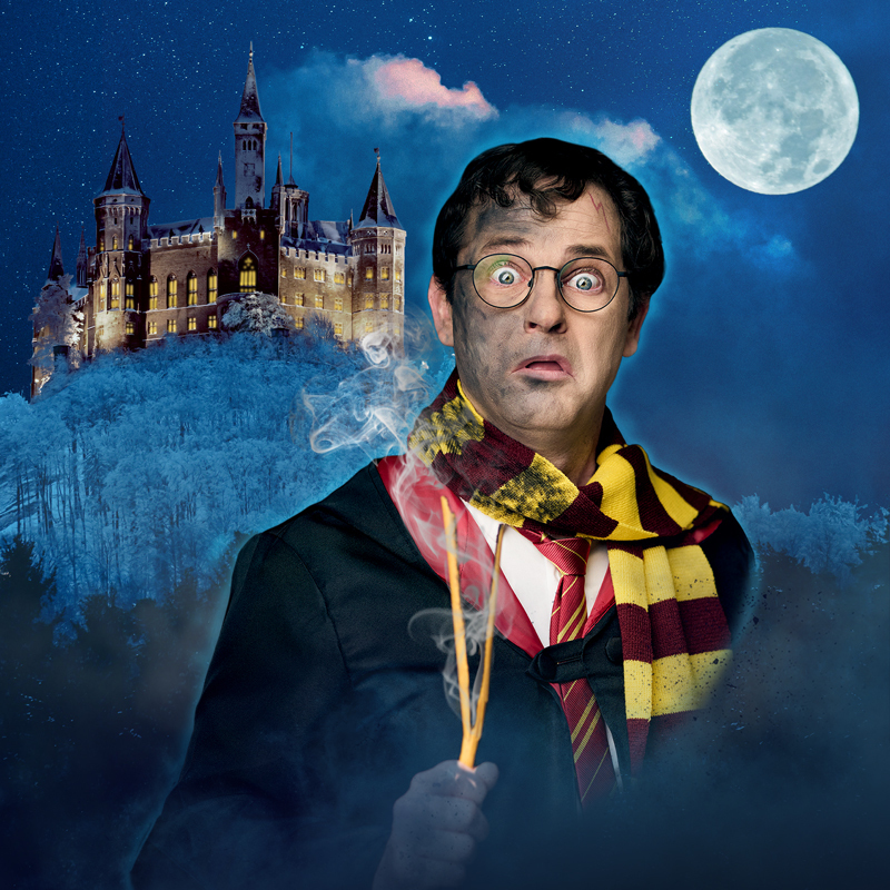 Barry Potter and the Magic of Wizardry - A man dressed as a wizard in front of an old fashioned castle with a full moon and a sky full of clouds