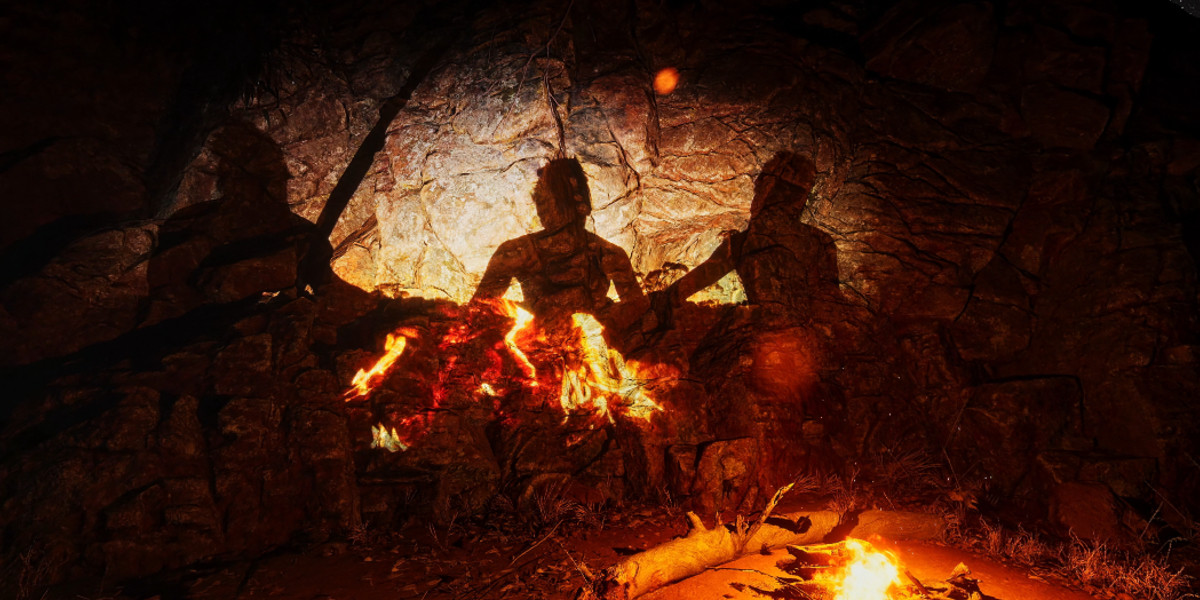 Shadows around a campfire