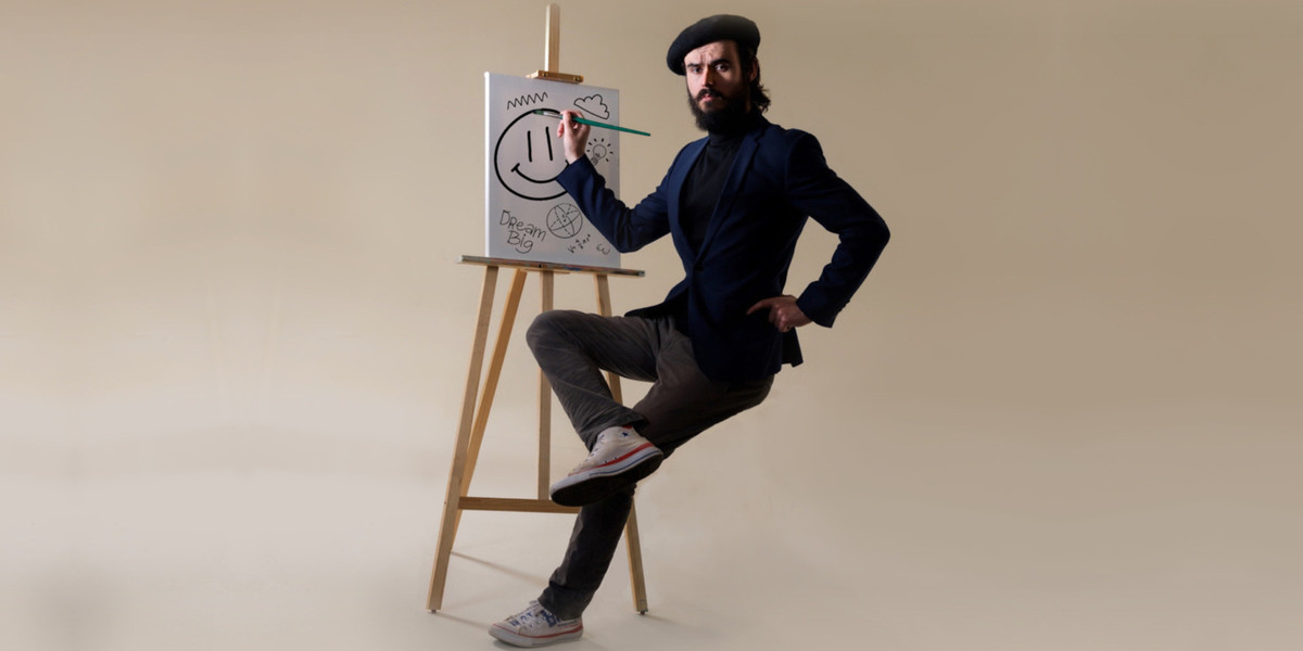 Sam Kissajukian: Museum of Modernia - Sam wears a beret. Sam wears a suit. There's an easel and a canvas. Marks have been made. But, what's most apparent is that Sam is sitting on a stool that isn't there.