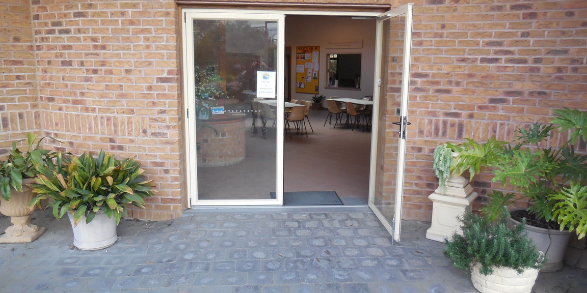 Entrance to the Foyer via two doors, with stepless entry of paved surface under verandah to front doors, and tiled flooring inside.