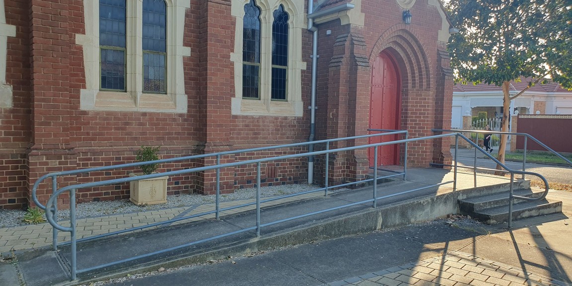 Main entrance to the church showing accessible ramp